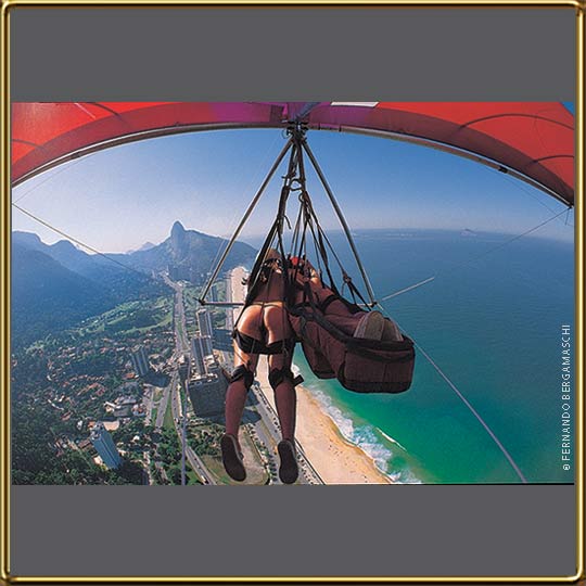 Naked couple on hang-glider